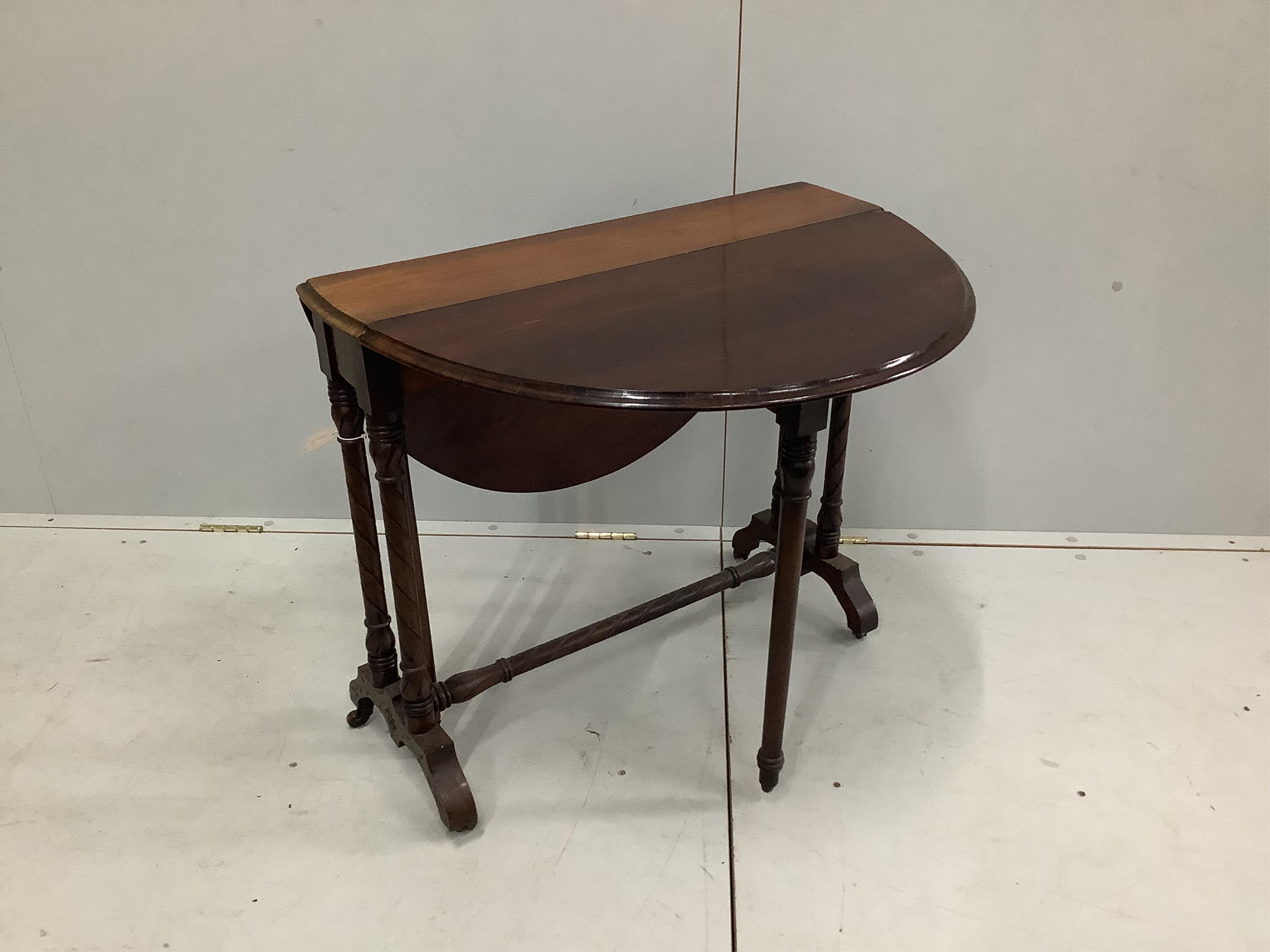 A Victorian mahogany Sutherland table, width 75cm, height 66cm, together with a late Victorian mahogany two tier occasional table. Condition - fair